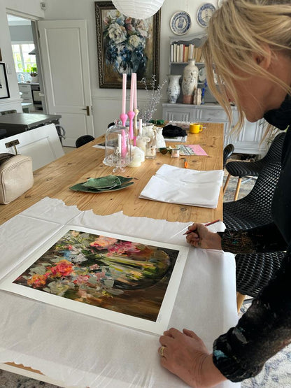 On Her Table - Kim Black signing her poster - Ruthanne Collection