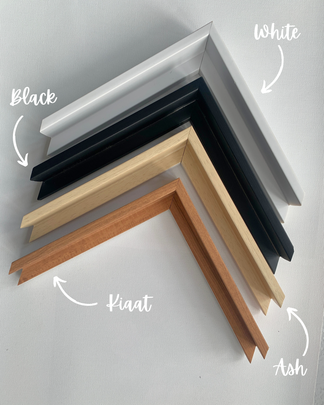 Framing options for artwork in black, white, ash, and kiaat finishes